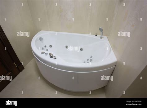 Modern bathroom with jacuzzi bath Stock Photo - Alamy