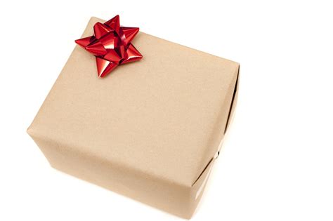 Photo Of Plain Wrapped Christmas Gift In Brown Paper Free Christmas