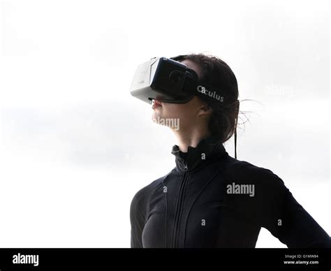 Young Caucasian Woman Wearing Oculus Rift Virtual Reality Headset