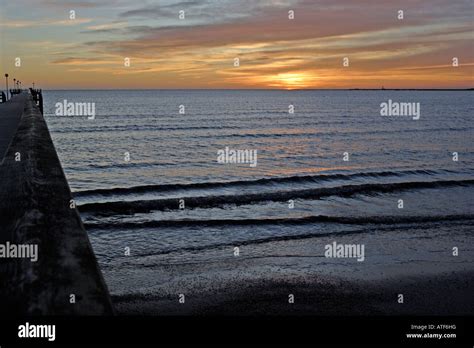 Sunset on the west coast Stock Photo - Alamy