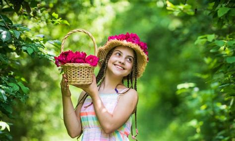 Premium Photo | My flowers summer vacation cheerful child in summer ...