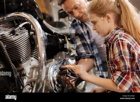 Attentive Lovely Dad Trying Protecting His Child Stock Photo Alamy