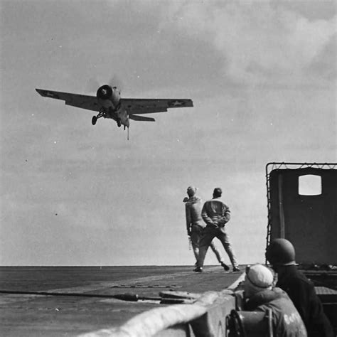 Signal Officer Directs Grumman Wildcat F4F Landing on Carrier 1942 Operation Torch | World War ...