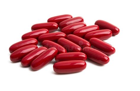 red capsule isolated stock photo image  treatment
