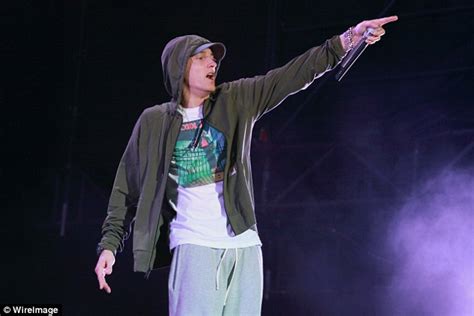 Eminem Steps Up Feud With Machine Gun Kelly And Drops New Diss Song