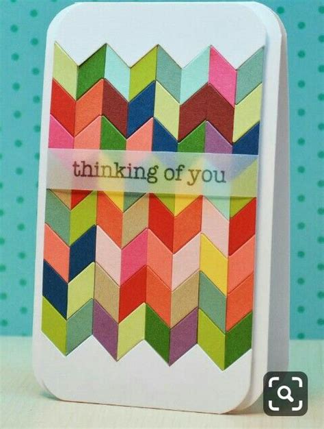 A Card That Has Been Made With Colored Paper And The Words Thinking Of