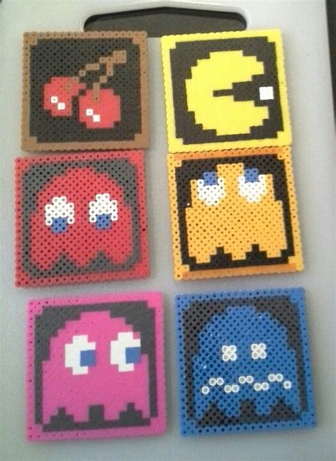 Four Pixel Art Coasters Are Shown In Different Colors And Sizes Each