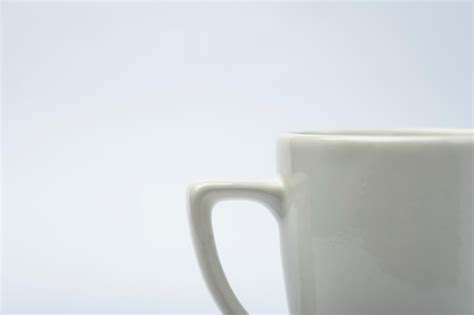 Premium Photo | White mug isolated on white background