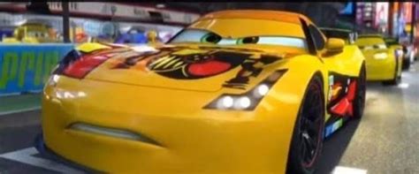 the cars are racing down the track in this video game, which features characters from disney and ...