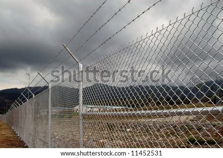 Cyclone Wire Fence Stock Photo 11452531 : Shutterstock