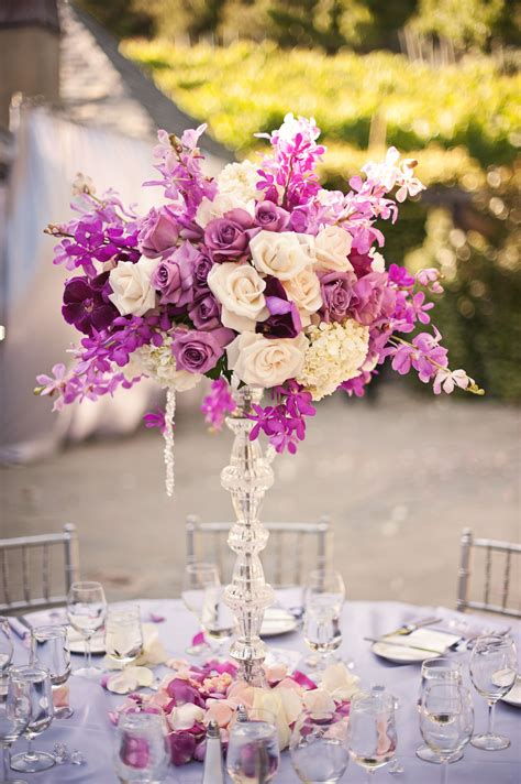 Do You Like The Tall Crystal Vases If You Want All Tables Alike I