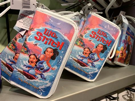 Photos New Lilo And Stitch And The Emperor S New Groove Vhs Wristlets Press Play At Disney Parks