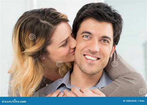 Girlfriend Kissing Her Boyfriend Stock Photo - Image of handsome ...