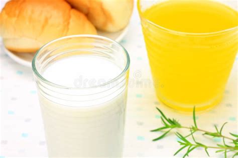 Milk and orange juice stock image. Image of cold, juice - 26195365