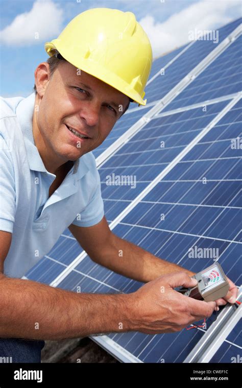 Man Installing Solar Panels Stock Photo Alamy