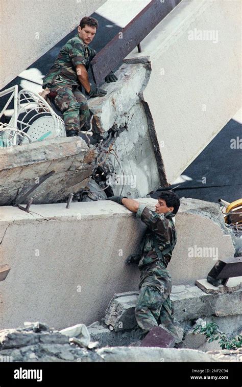 American Troops Scale Up The Collapsed Building Of Hyatt Hotel In