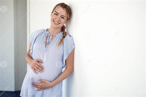 Happy Pregnant Young Woman Cradling Her Belly Zdjęcie Stock Obraz