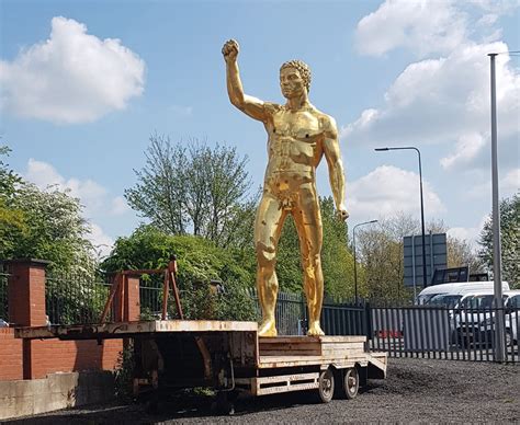 Massive Golden Statue Of Naked Man Removed From Wigan Car Park After