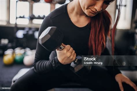 Woman Training With Dumbbell Stock Photo - Download Image Now - Women's ...
