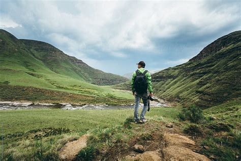 "Photographer Hiker Exploring The Mountains On A Rainy Day" by Stocksy ...