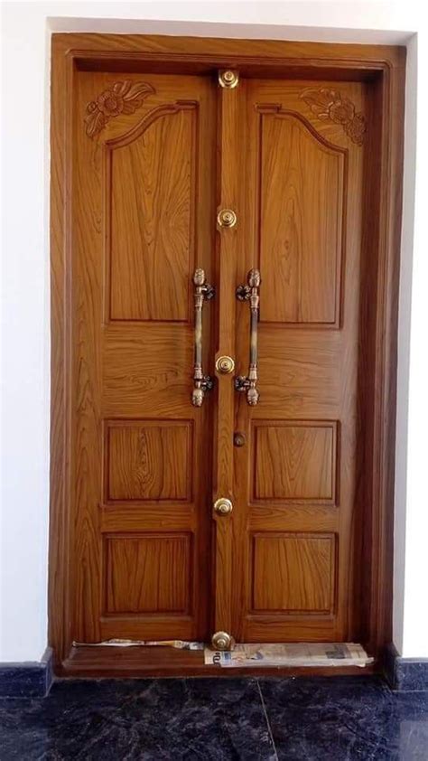 Two Wooden Doors Are Open On The Floor