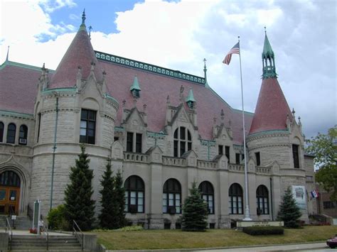 an old building with two towers on top