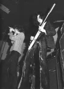 Black And White Photograph Of Two Men Playing Guitars