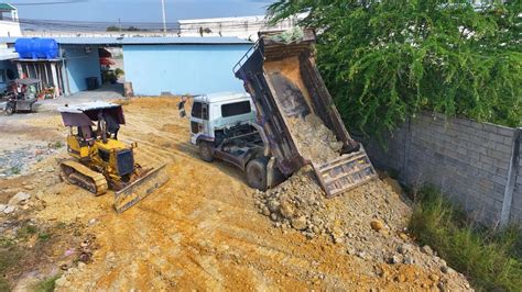 Nice Incredible Land Filling By Bulldozer KOMATSU D20P With Dump Truck