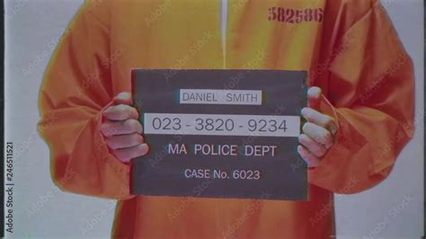 Video „mugshot At A Police Station Of A Criminal In An Orange Suit 80s