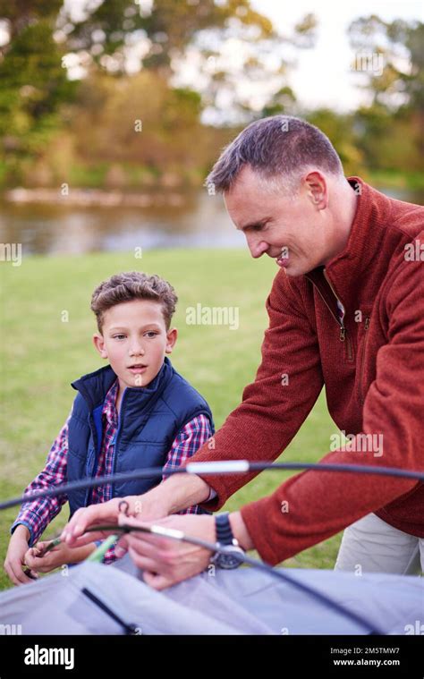 And Its As Easy As That A Father And Son Setting Up A Tent Together