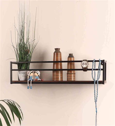 Buy Black Metal Wall Shelf By Pristine Interiors at 5% OFF by Pristine Interiors | Pepperfry