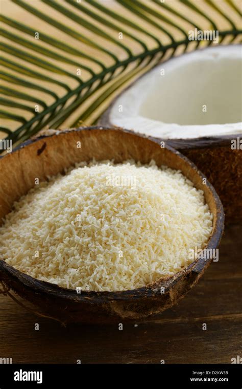 Grounded Coconut Flakes And Fresh Coconut Stock Photo Alamy