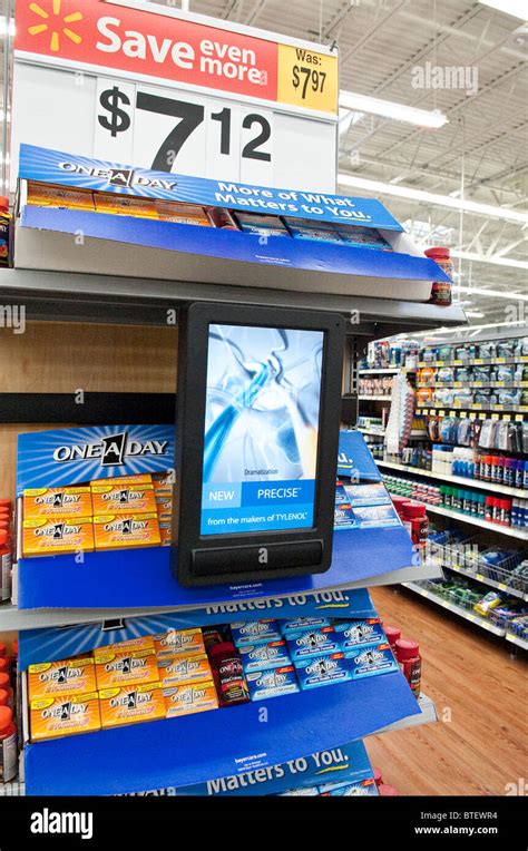 Digital Signage On Flat Screen Monitor Markets Vitamins On End Cap