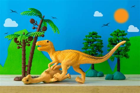 Dinosaur fight scene on wild models background 11973460 Stock Photo at ...