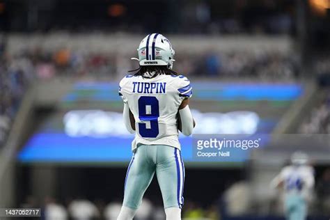 KaVontae Turpin of the Dallas Cowboys looks down field against the ...