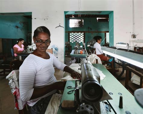 Factory Worker Reading the Manual · Free Stock Photo