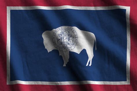 Premium Photo Wyoming Us State Flag With Big Folds Waving Close Up