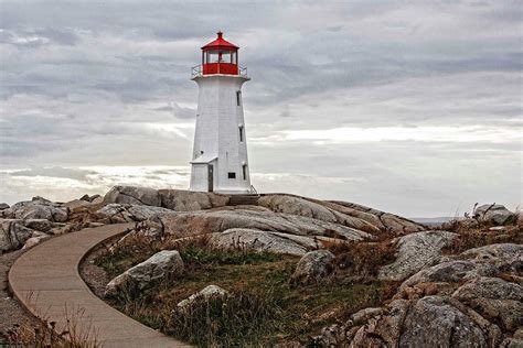 Peggys Point Lighthouse Photograph By Hany J Pixels