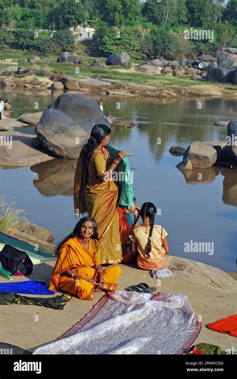 Indian Women At The Tungabhadra River In Hampi Karnataka South India