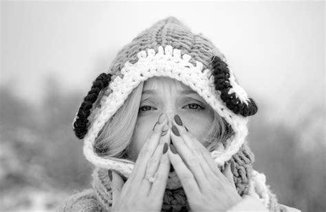 Premium Photo | Woman with winter allergy symptoms blowing nose portrait of young woman sniffing ...