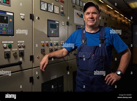 Proud And Happy Mechanic Chief Engineer Posing With His Arms Crossed