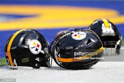 Detailed view of Pittsburgh Steelers helmets on the field prior to an ...