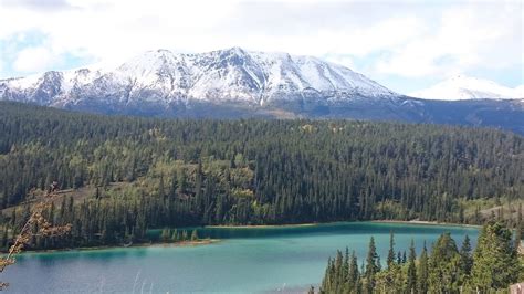 Majestic Landscape with lake, Mountains, and Forest in Yukon Territory ...