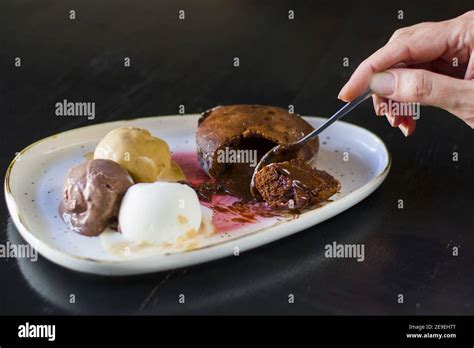 Plate Of Volcano Dessert With Ice Cream Stock Photo Alamy