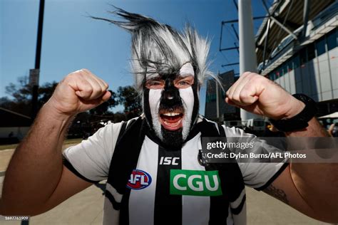 Collingwood Fan Pose For A Photo During The 2023 Afl Grand Final