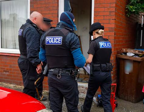 Topless Man Cuffed As Police Make Arrests In Scouse Jonno Raids Liverpool Echo