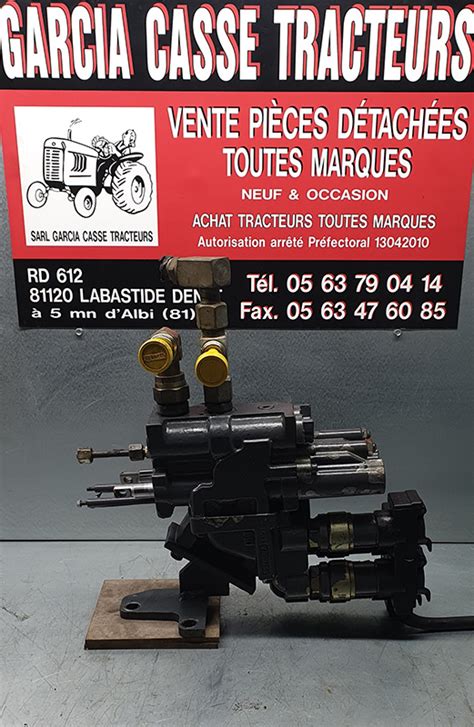 DISTRIBUTEUR HYDRAULIQUE NEW HOLLAND TS 115 COTE DROIT OCCASION CASSE