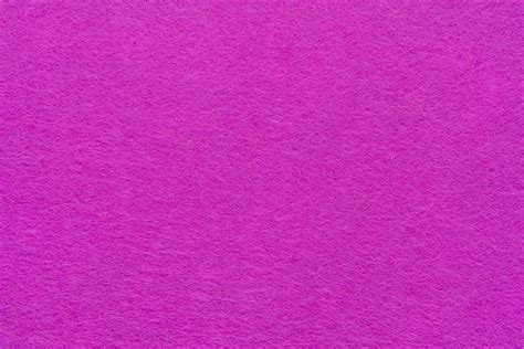 Premium Photo Close Up Of Bright Pink Felt Fabric Texture Of Rough