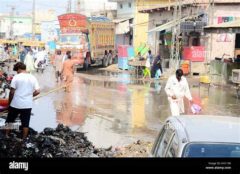 Inundated Streets By Overflowing Sewerage Water Creating Problems For