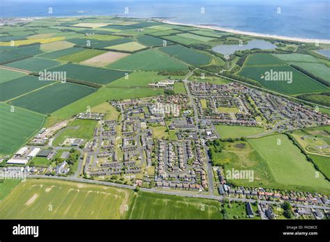 An Aerial View Of The Village Of South Broomhill In Northumberland